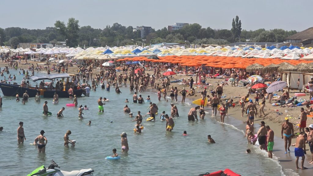 Turiști, plajă